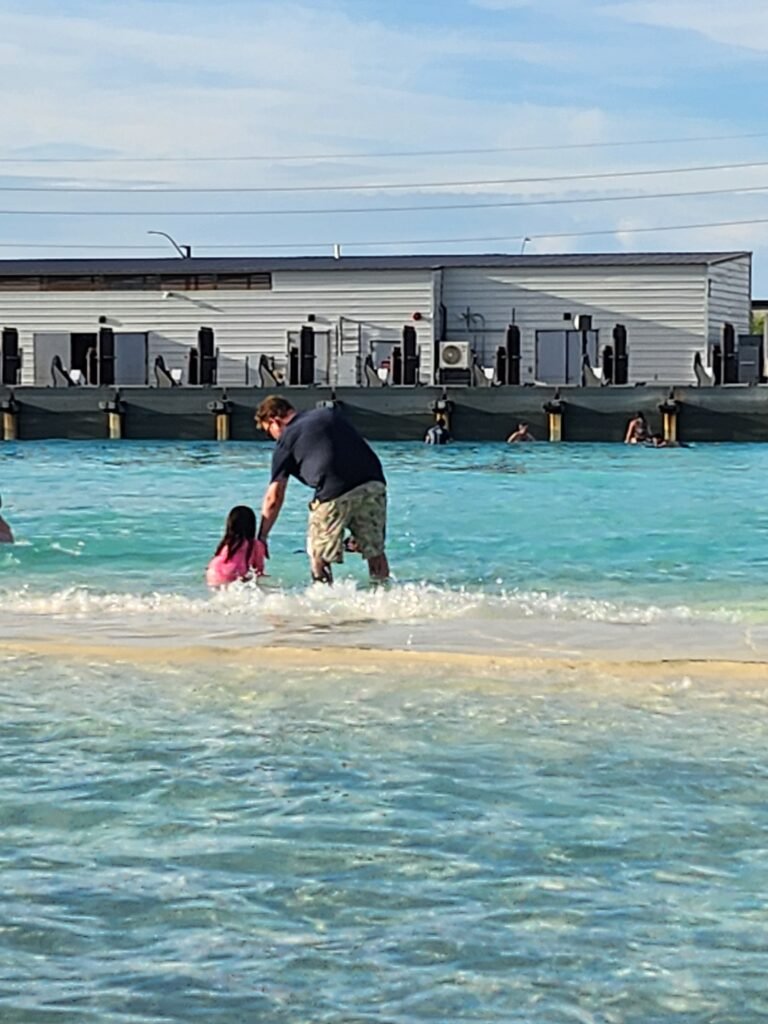 father and child revel surf